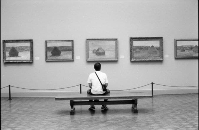 Black and white people photograph titled Waiting at Monet by Angelique Antoniou